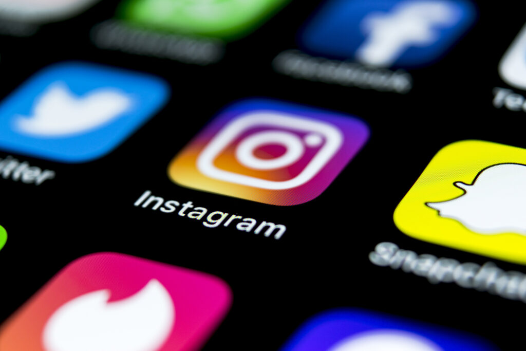 Instagram social media icon on iPhone X screen