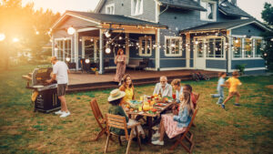 A family enjoying a BBQ in their backyard.